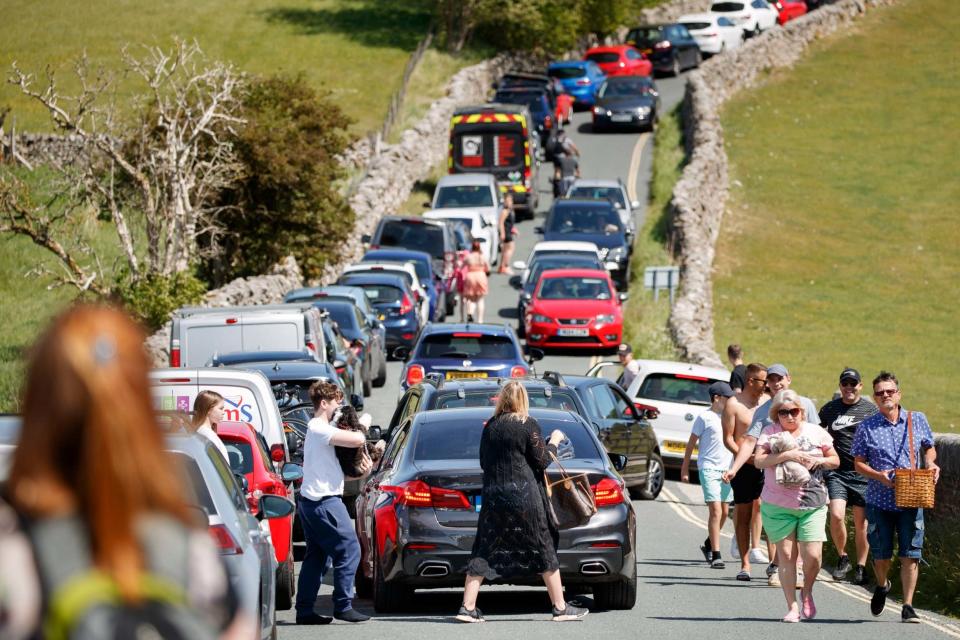 Gridlock stretches on a road in Burnsall in the Yorkshire Dales (PA)