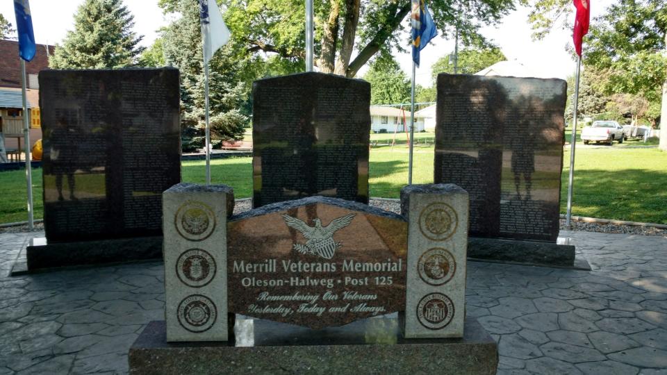 A photo of the memorial veterans wall in Merrill, Iowa where David Bauer's name appears.