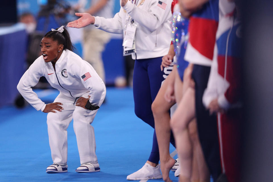 <p>TOKYO, JAPAN - JULY 27: Simone Biles of Team United States cheers during the Women's Team Final on day four of the Tokyo 2020 Olympic Games at Ariake Gymnastics Centre on July 27, 2021 in Tokyo, Japan. (Photo by Ezra Shaw/Getty Images)</p> 