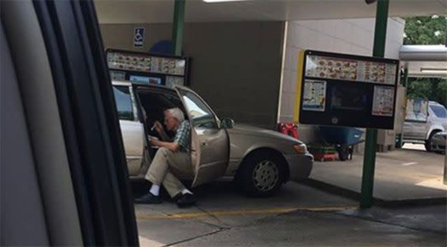 Sweet gesture: an elderly man was snapped spoon-feeding his wife ice cream in the afternoon heat. Picture: Brent Kelley/Facebook