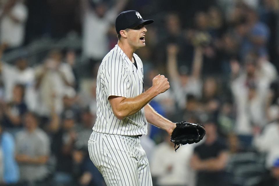 New York Yankees relief pitcher Clay Holmes celebrates after the second baseball game of the team's doubleheader against the Los Angeles Angels on Thursday, June 2, 2022, in New York. The Yankees won 2-1. (AP Photo/Frank Franklin II)