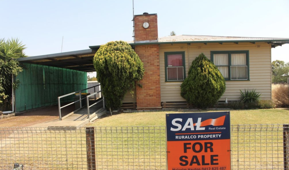 The Serviceton property with a for sale sign outside. 