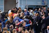 <p>Britain's Prince Charles, Prince of Wales, greets well wishers as he departs Confederation Building in St. John's, Newfoundland and Labrador on May 17, 2022. (Photo by Geoff Robins / AFP)</p> 