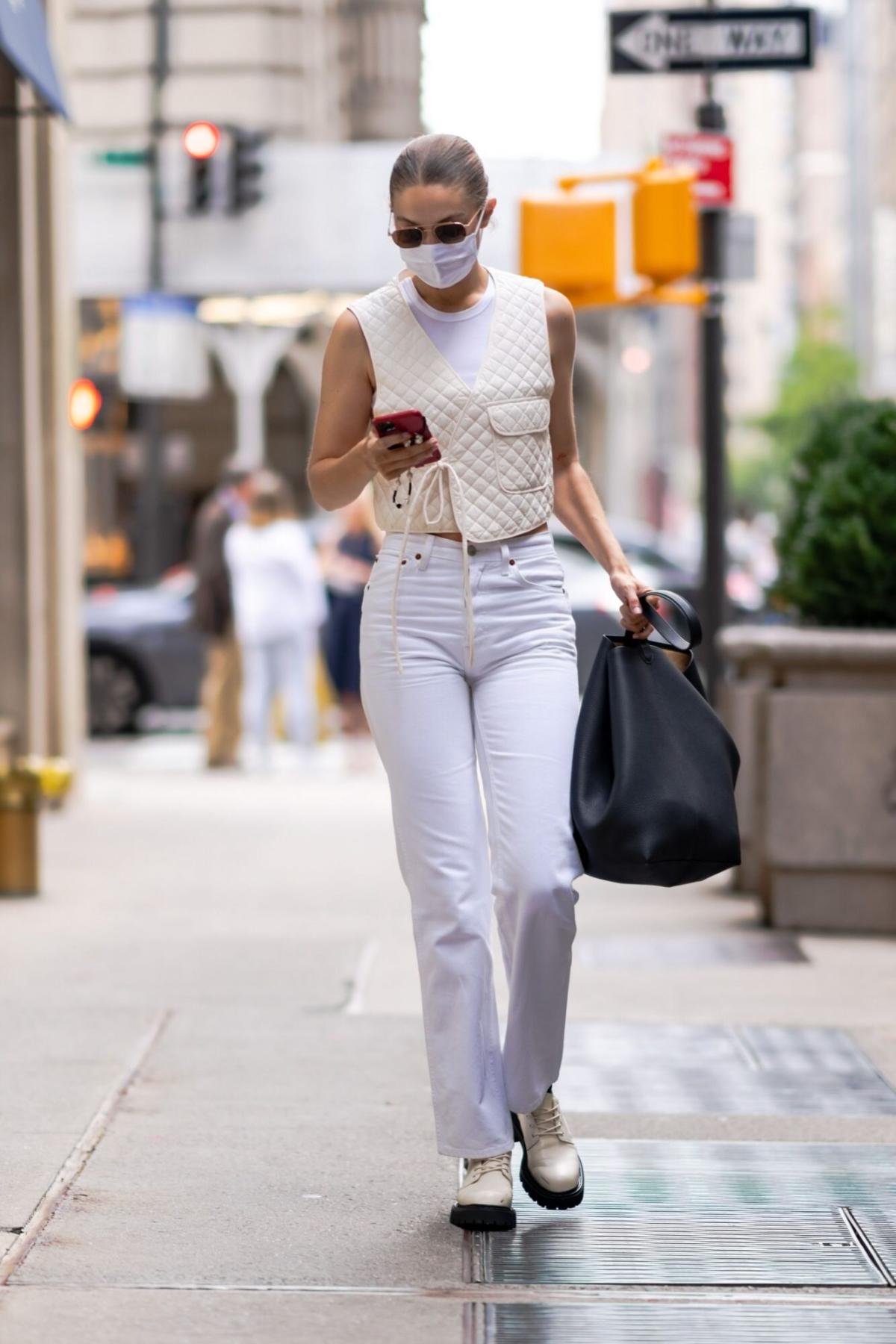 Gigi Hadid White Suit and Bear Bag