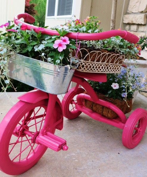 <p>Once your kids outgrow their bike, transform it into something new for you. And if you really want to be an over-achiever, give it a coat of paint that matches the petals it'll hold.</p><p><a rel="nofollow noopener" href="http://judysturman.typepad.com/in_his_grip/repurposed-treasures/" target="_blank" data-ylk="slk:See more at In His Grip... »;elm:context_link;itc:0;sec:content-canvas" class="link "><em>See more at In His Grip... »</em></a></p>