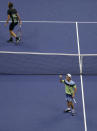 Diego Schwartzman, of Argentina, bottom, pumps his fist after winning a point against Alexander Zverev, of Germany, during the fourth round of the US Open tennis championships Monday, Sept. 2, 2019, in New York. (AP Photo/Frank Franklin II)