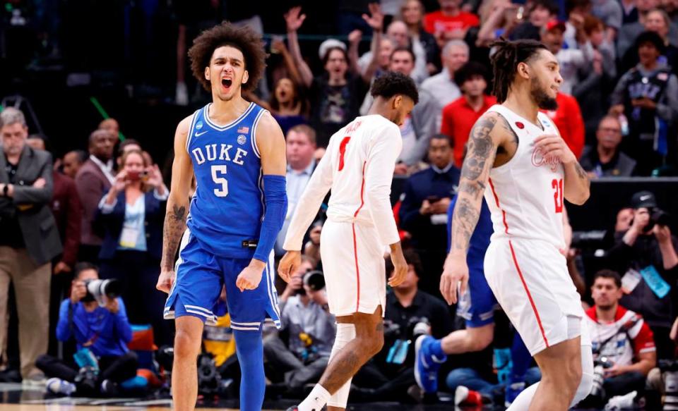 Duke’s Tyrese Proctor (5) celebrates as time expires in Duke’s 54-51 victory over <a class="link " href="https://sports.yahoo.com/nba/teams/houston/" data-i13n="sec:content-canvas;subsec:anchor_text;elm:context_link" data-ylk="slk:Houston;sec:content-canvas;subsec:anchor_text;elm:context_link;itc:0">Houston</a> in their NCAA Tournament Sweet 16 game at the American Airlines Center in Dallas, Texas, Friday, March 29, 2024. Ethan Hyman/ehyman@newsobserver.com