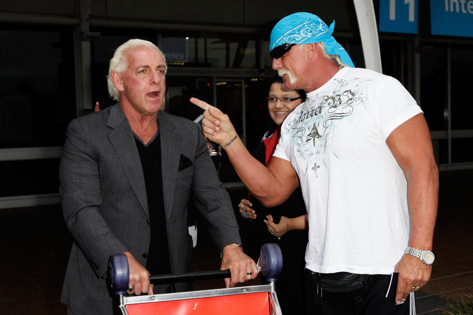 SYDNEY, AUSTRALIA - NOVEMBER 17:  Hulk Hogan (R) and Ric Flair arrive at Sydney Airport, ahead of the Australian Hulkamania tour on November 17, 2009 in Sydney, Australia.  (Photo by Brendon Thorne/Getty Images)