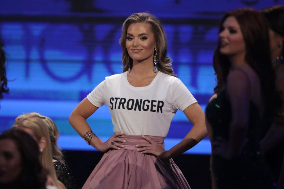 During the introduction of Miss America contestants, Morgan Nichols, Miss South Carolina, wears a white T-shirt bearing the word "STRONGER."