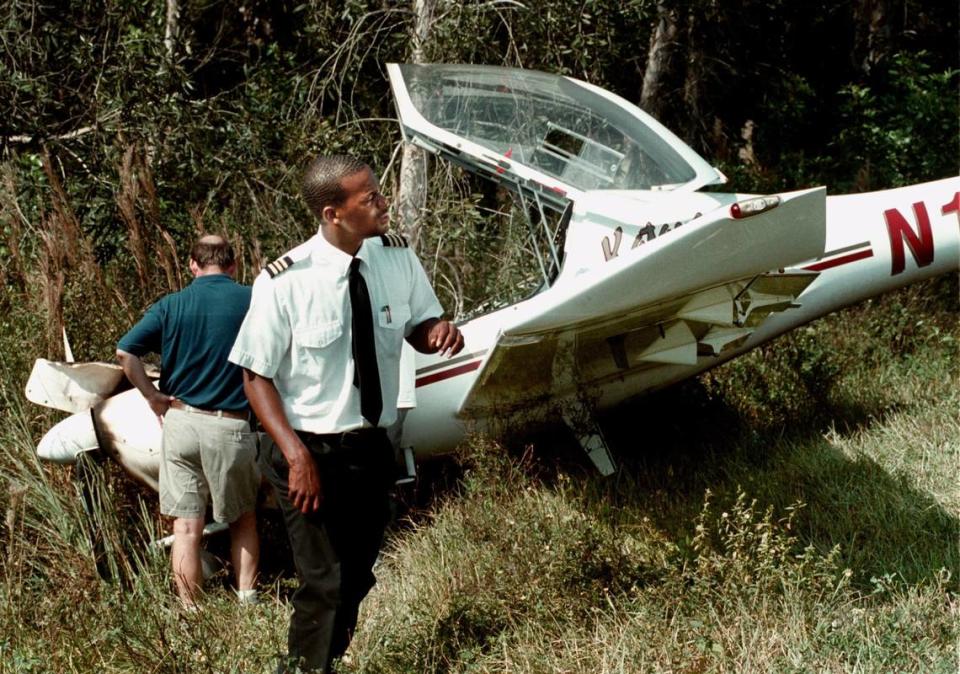 Flight instructor Damion Lawrence, 20, walked away with no injuries after landing his plane on U.S. 27 at Johnson Street on Nov. 6, 2000. A student pilot was at the controls of the single-engine, two-seater plane when they smelled smoke. Lawrence took over control of the plane and set it down on the highway. The two got out and pushed the plane off the road. The plane is owned by Pelican Airways at North Perry Airport in Pembroke Pines.