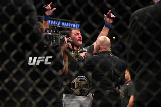 Miocic celebrates regaining the heavyweight title (Getty)