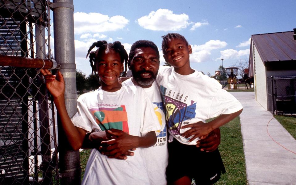 Richard Williams with his daughter Venus and Serena in 1991 - Getty Images North America