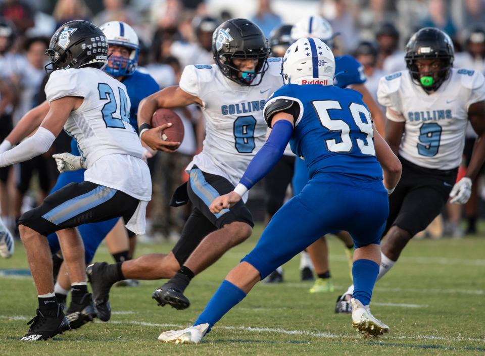 Collins High's Kenyon Goodin runs from the line of scrimmage against Spencer County High.  Sept. 9, 2022