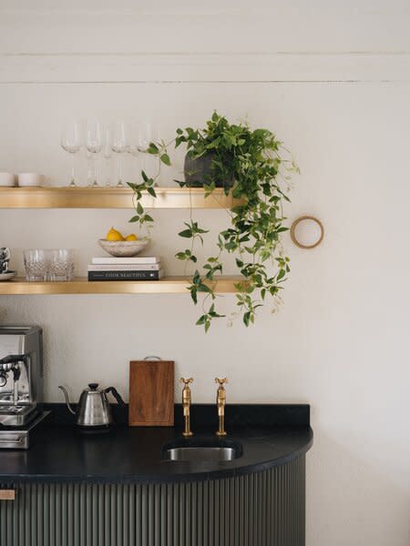 A faux hanging Philodendron brings the experience of tropical, trailing greenery into your home without the need for a green thumb (or water or light).
