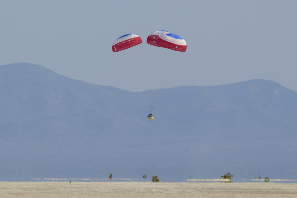 Boeing's CST-100 Starliner spacecraft lands at White Sands Missile Range's Space Harbor, Wednesday, May 25, 2022, in New Mexico. (Bill Ingalls/NASA via AP)