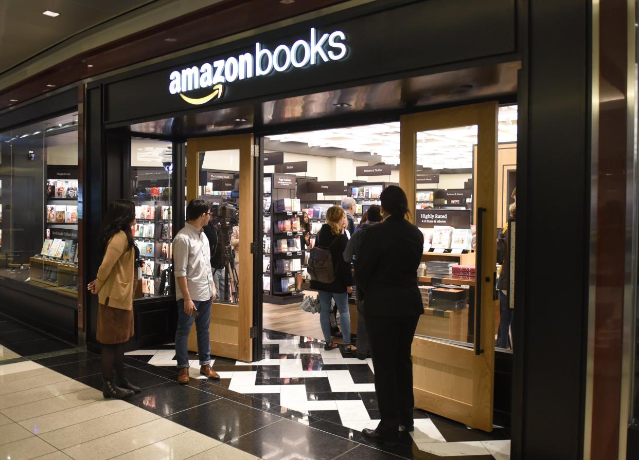<p>Customers arrive at Amazon Books in Manhattan's Time Warner Center on May 25, 2017 as the online retailing giant Amazon.com Inc. opens its first New York City bookstore.</p> (Getty Images)