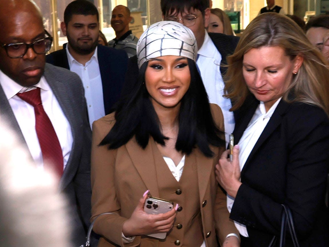 Cardi B is seen departing the Ronald Reagan Federal Building and U.S. Courthouse on October 21, 2022 in Santa Ana, California. A jury ruled in Cardi B's favor after she was sued for copyright infringement for allegedly using an image of a man's tattoo on a mixtape cover.