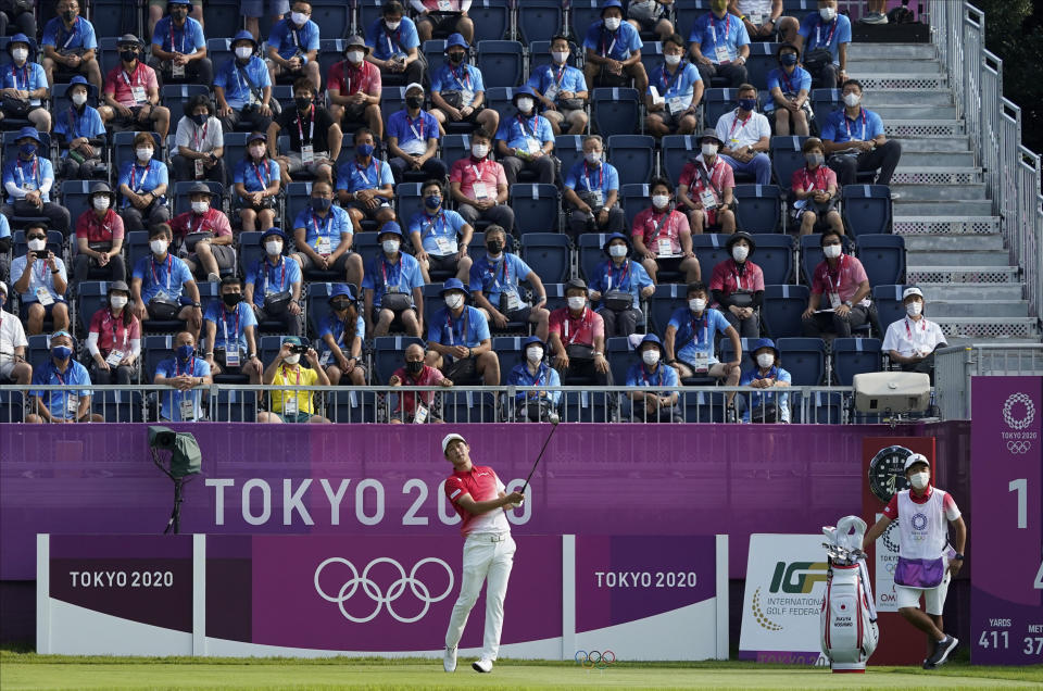 Japan's Rikuya Hoshino watches his tee shot on the first hole during the first round of the men's golf event at the 2020 Summer Olympics on Wednesday, July 28, 2021, at the Kasumigaseki Country Club in Kawagoe, Japan. (AP Photo/Matt York)