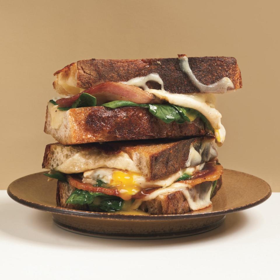 This grilled cheese already has trouble containing itself. Add a runny egg, and you're entering some messy territory. Pass the napkins. <a href="https://www.epicurious.com/recipes/food/views/grilled-cheese-and-fried-egg-sandwiches-364551?mbid=synd_yahoo_rss" rel="nofollow noopener" target="_blank" data-ylk="slk:See recipe.;elm:context_link;itc:0;sec:content-canvas" class="link ">See recipe.</a>