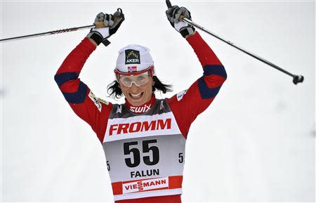 Norway's Marit Bjorgen celebrates after winning the women's prologue 2.5km classic individual World Cup ski race in Falun March 18, 2011. REUTERS/Anders Wiklund/SCANPIX