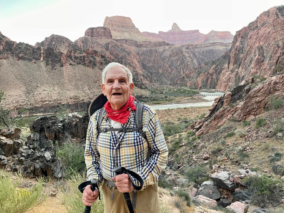 Alfredo Aliaga, 92, takes a break on his ascent of the Grand Canyon on Oct. 15, 2023.