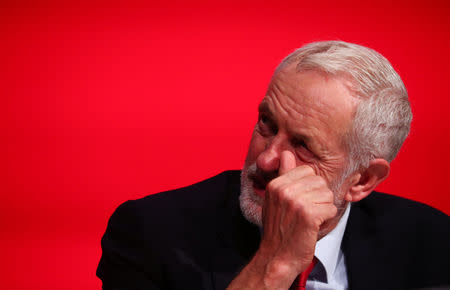 The Labour Party's leader, Jeremy Corbyn, listens to a speech by Alfred Dubbs during his party's conference in Liverpool, Britain, September 25, 2018. REUTERS/Hannah McKay