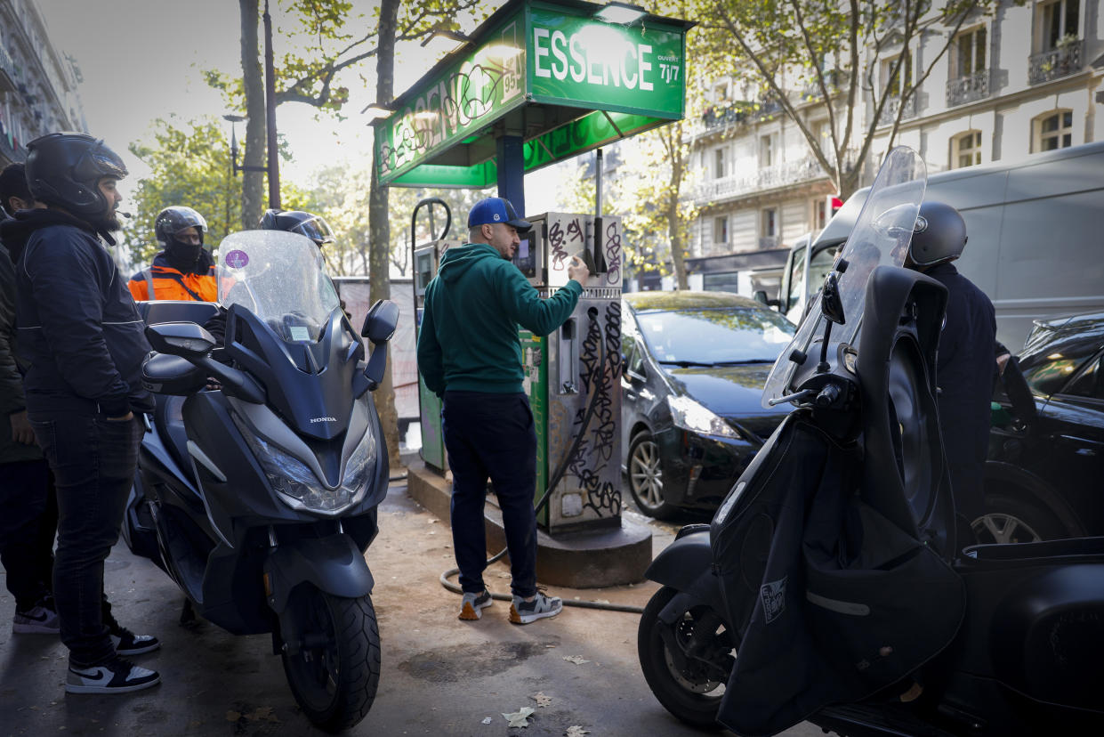 Lines formed at gas stations as some pumps have been running dry in France because of a strike by energy workers, as seen here on October 12, 2022 in Paris. / Credit: Geoffroy Van der Hasselt/Anadolu Agency/Getty