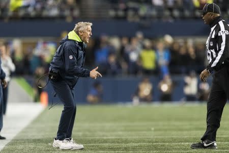 Dec 23, 2018; Seattle, WA, USA; Seattle Seahawks head coach Pete Carroll yells at head linesman Phil McKinnely (110) during the second half at CenturyLink Field. Seattle defeated Kansas City 38-31. Mandatory Credit: Steven Bisig-USA TODAY Sports