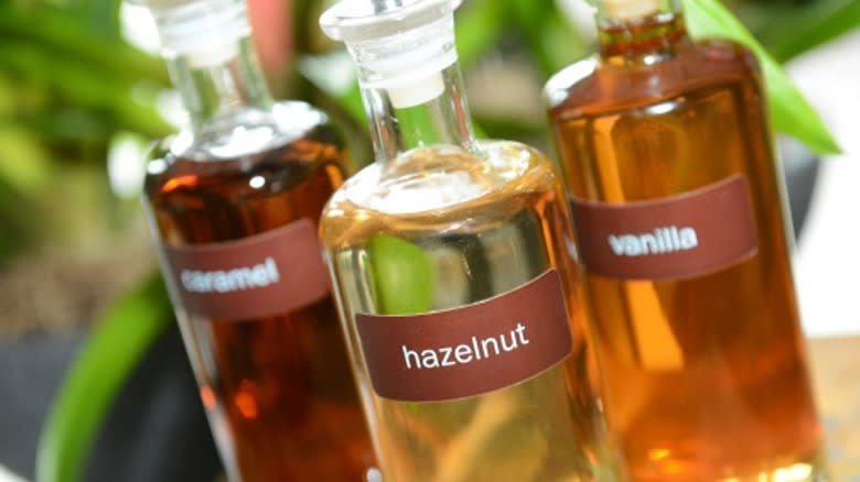 variety of homemade syrup in bottles