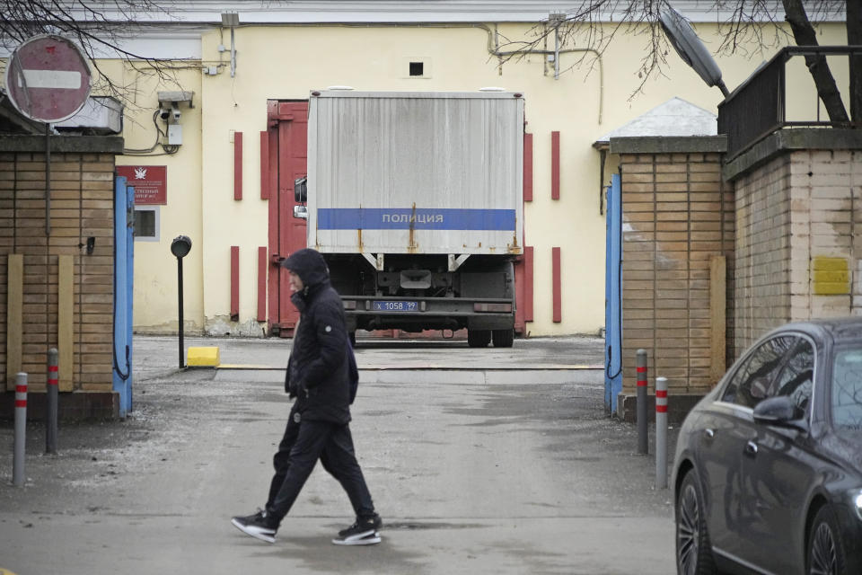 A man walks past an entrance of the Lefortovo prison, in Moscow, Russia, Thursday, March 30, 2023. Russia's top security agency says an American reporter for the Wall Street Journal has been arrested on espionage charges. The Federal Security Service said Thursday that Evan Gershkovich was detained in the Ural Mountains city of Yekaterinburg while allegedly trying to obtain classified information. (AP Photo/Alexander Zemlianichenko)