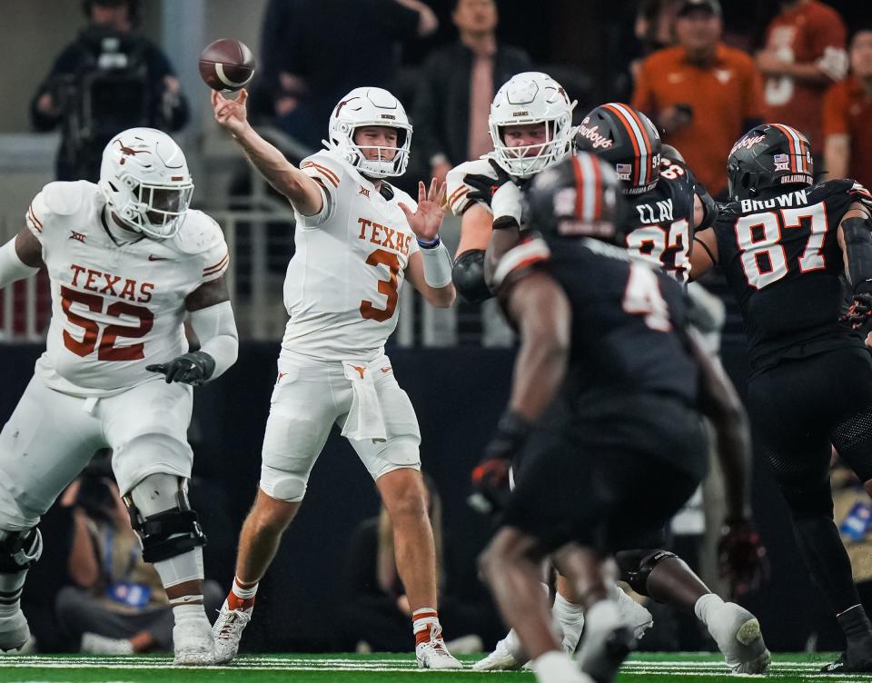 Texas quarterback Quinn Ewers (3) sends a pass to a teammate in the third quarter of the Big 12 Conference Championship game at AT&T Stadium in Arlington, Texas, Saturday, Dec. 2, 2023. Texas won the game 49- 21 to become 2023 Big 12 Conference Champions.