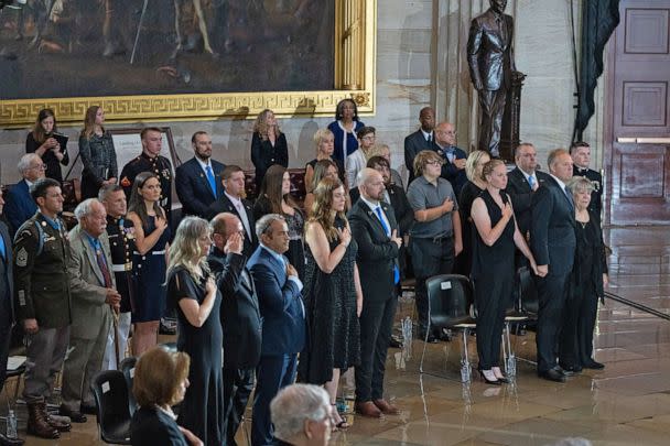 PHOTO:  Family members of Marine Chief Warrant Officer 4 Hershel Woodrow  'Woody' Williams, the last surviving World War II Medal of Honor recipient, react as his casket lays in honor in the US Capitol Rotunda on July 14, 2022 in Washington, DC.  (Pool/Getty Images)