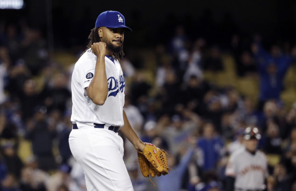 Los Angeles Dodgers relief pitcher Kenley Jansen reacts after getting San Francisco Giants' Pablo Sandoval to ground into a double play to end the baseball game, Tuesday, April 2, 2019, in Los Angeles. (AP Photo/Marcio Jose Sanchez)