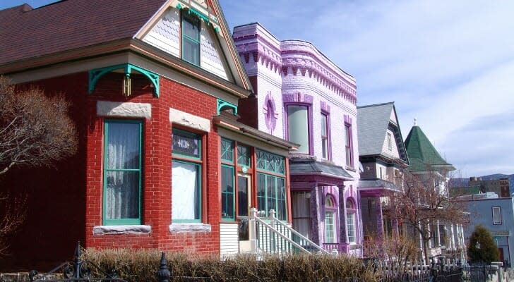 Image shows a row of houses on a residential street. SmartAsset analyzed mortgage payment data to conduct this study on how the composition of mortgage payments changes over time.