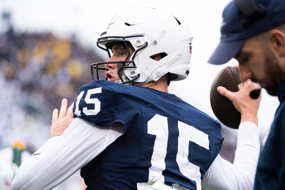 Penn State quarterback Drew Allar warms up during a timeout in the second half against Michigan Saturday, Nov. 11, 2023, in State College, Pa.
