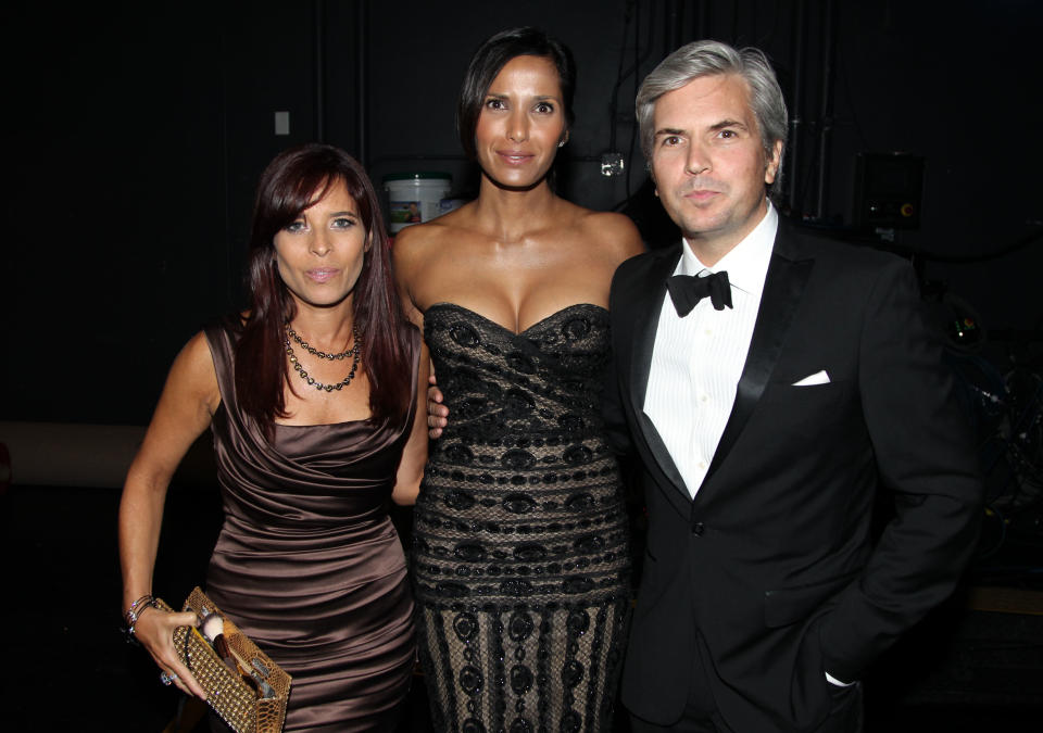 Jane Lipsitz, left, Padma Lakshmi, center, and Dan Cutforth pose backstage at the 2012 Creative Arts Emmys at the Nokia Theatre on Saturday, Sept. 15, 2012, in Los Angeles. (Photo by Matt Sayles/Invision/AP)