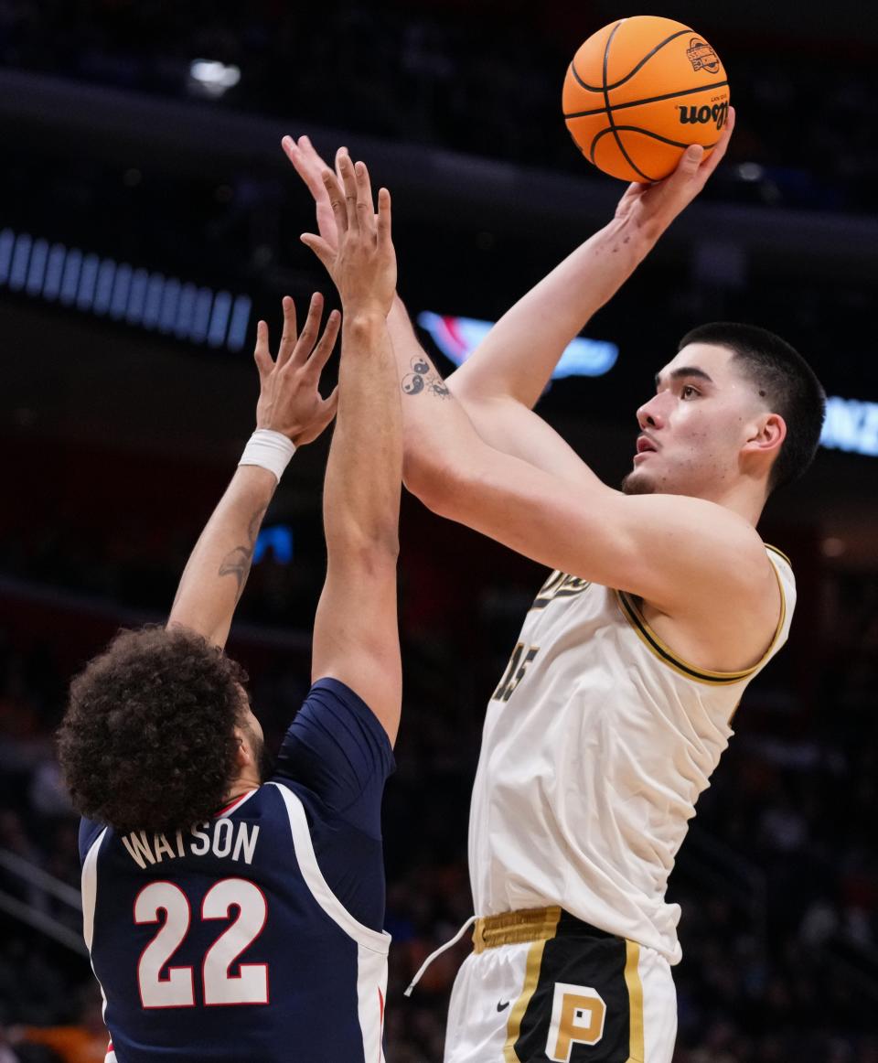 Purdue Boilermakers center Zach Edey (15) shoots the ball against Gonzaga Bulldogs forward Anton Watson (22) on Friday, March 29, 2024, during the midwest regional semifinals at the Little Caesars Arena in Detroit. The Purdue Boilermakers defeated the Gonzaga Bulldogs, 80-68.