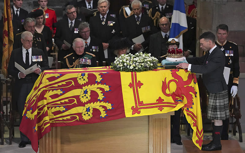 The Duke of Hamilton places the Crown of Scotland on the coffin of Queen Elizabeth II