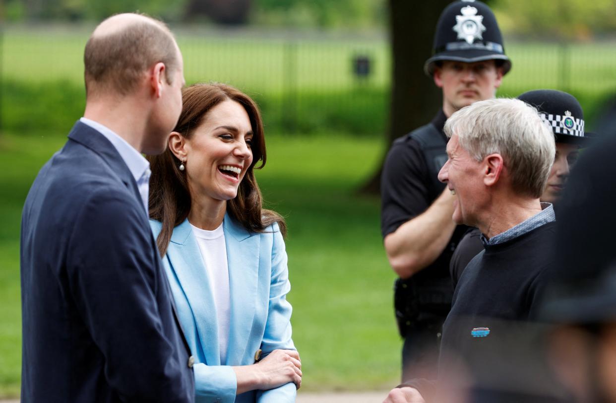 Prince William and Catherine, Princess of Wales greet well-wishers along the Long Walk outside Windsor Castle (REUTERS)