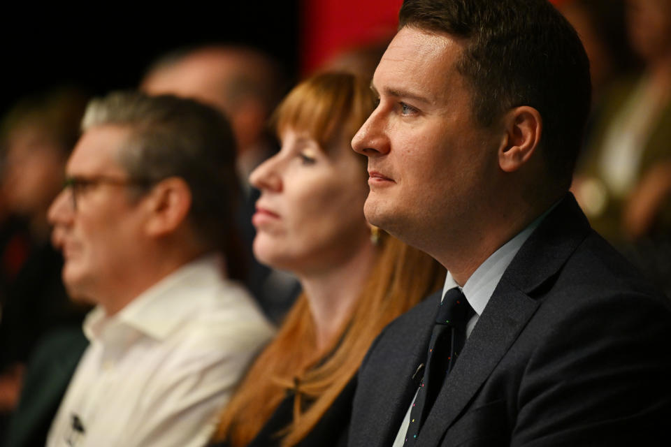 PURFLEET, UNITED KINGDOM - MAY 16: (LR) Labour Party Leader Sir Keir Starmer, Deputy Leader Angela Rayner and Shadow Health Secretary Wes Streeting attend an event to showcase Labour's election promises at The Backstage Centre on May 16, 2024 in Purfleet, United Kingdom. Labour Party Leader Keir Starmer promises to deliver economic stability, cut NHS waiting times, launch a new Border Security Command, establish Great British Energy and employ 6,500 new teachers if Labour wins the next general election. (Photo by Leon Neal/Getty Images)