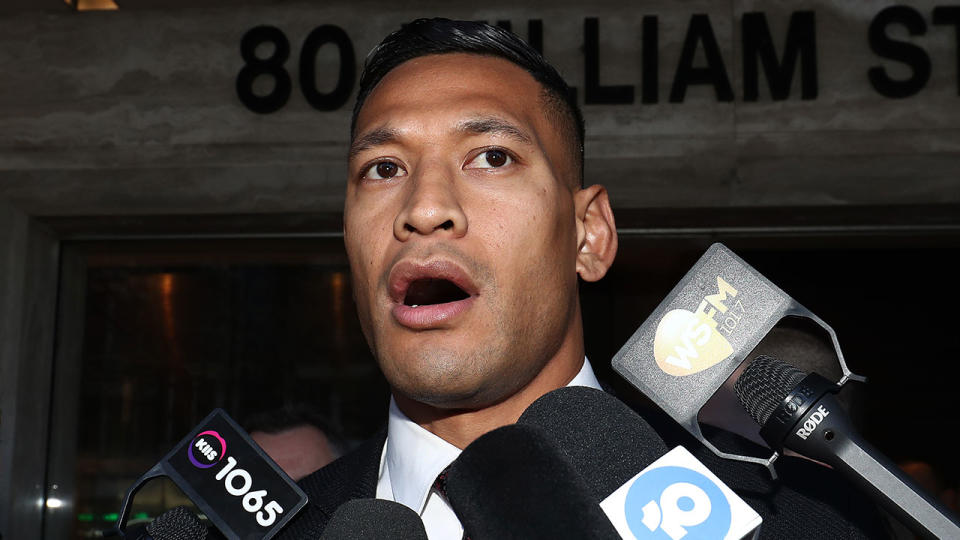 Pictured here, Israel Folau speaks to reporters about his legal battle with Rugby Australia. 