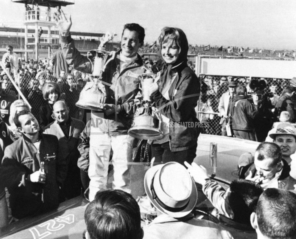 Mario in Victory Lane with wife Dee Ann after winning the 1967 Daytona 500.