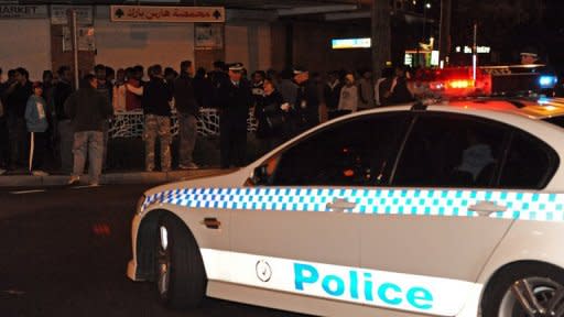 This file photo shows Australian police attempting to disperse gangs in Sydney, in 2009. An escalating gun war in Sydney saw five overnight drive-by shooting attacks, Australian police said Tuesday, as they struggled to bring the gangland violence under control