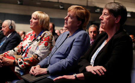 Claudia Roth of the German Green Party, German Chancellor Angela Merkel and Barbara Hendricks Federal Minister for the Environment, Nature Conservation, Building and Nuclear Safety attend the COP23 U.N. Climate Change Conference in Bonn, Germany, November 15, 2017. REUTERS/Wolfgang Rattay