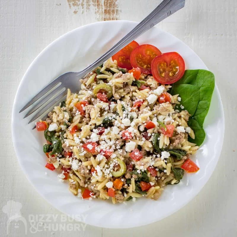 <p>Dizzy Busy & Hungry</p><p>Your whole family will love this delicious skillet ground beef meal made with orzo and briny olives. </p><p><strong>Get the recipe: </strong><a href="https://dizzybusyandhungry.com/ground-beef-recipes-beef-orzo-skillet/?fbclid=IwAR224lUe-999Khfrr1d_rCv1N1b6xxfXAP-JS4JdqK2N16CW_i3apg7_u9I" rel="nofollow noopener" target="_blank" data-ylk="slk:Easy One Skillet Ground Beef Recipe with Orzo;elm:context_link;itc:0;sec:content-canvas" class="link rapid-noclick-resp"><strong>Easy One Skillet Ground Beef Recipe with Orzo</strong></a></p><p><strong>Related: <a href="https://parade.com/1018830/parade/ground-beef-recipes/" rel="nofollow noopener" target="_blank" data-ylk="slk:150+ Ground Beef Recipes;elm:context_link;itc:0;sec:content-canvas" class="link rapid-noclick-resp">150+ Ground Beef Recipes</a></strong></p>