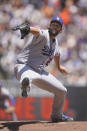 Los Angeles Dodgers' Clayton Kershaw pitches against the San Francisco Giants during the third inning of a baseball game in San Francisco, Thursday, Aug. 4, 2022. (AP Photo/Jeff Chiu)