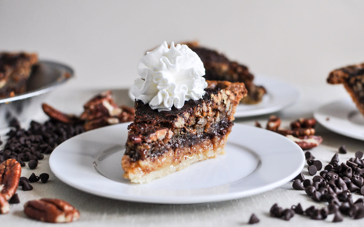 <p>Jessica Merchant</p><p>With coffee, honey and chocolate, this pie makes a decadent spring dessert.</p><p><strong>Get the recipe: <a href="https://parade.com/842182/communitytable/chocolate-honey-nut-pie/" rel="nofollow noopener" target="_blank" data-ylk="slk:Chocolate Honey Nut Pie;elm:context_link;itc:0;sec:content-canvas" class="link rapid-noclick-resp">Chocolate Honey Nut Pie</a></strong></p>