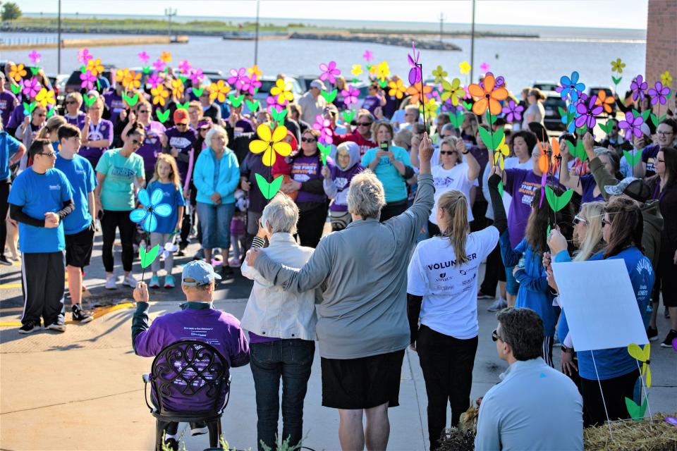 FILE - Promise Garden Ceremony at the Walk to End Alzheimer's at Manitowoc-Two Rivers YMCA in a previous year.