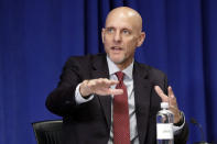 Food and Drug Administration Commissioner Dr. Stephen Hahn gestures as he speaks during a roundtable discussion at the University of Miami Miller School of Medicine Don Soffer Clinical Research Center, Monday, July 27, 2020, in Miami. Pence was in Florida to mark the beginning of Phase III trials for a Coronavirus vaccine. (AP Photo/Wilfredo Lee)