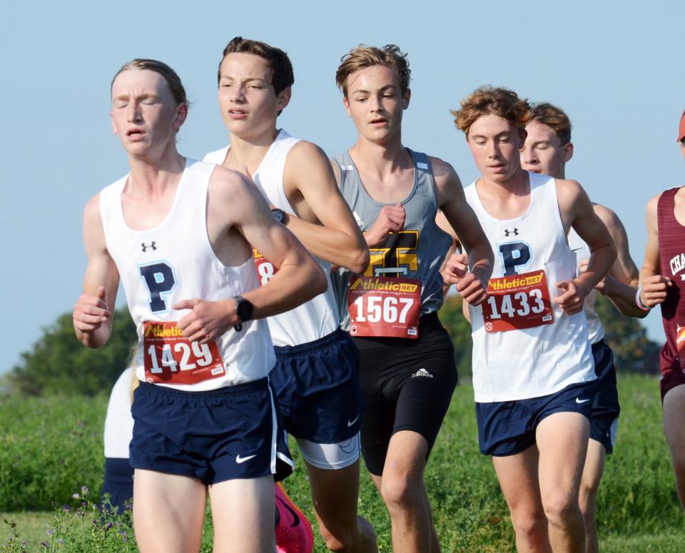 Petoskey's (from left) Jack Lindwall, Parker Fettig and Dylan Odenbach all helped get the Northmen to a runner-up conference finish Tuesday at the Big North Conference championships in Traverse City.